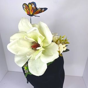 Spring magnolia fascinator with butterfly